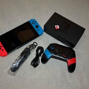 Nintendo Switch Console with Red and Blue Controllers